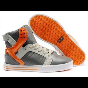 orange-and-white supra high-top sneakers