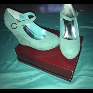 Turquoise suede Mary Jane wedge pumps