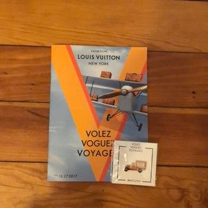 Louis Vuitton pin and booklet
