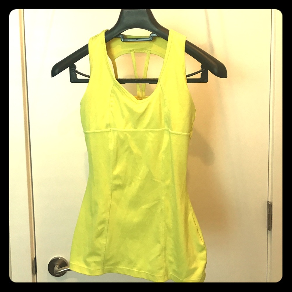 Mpg. Bright yellow sport top.