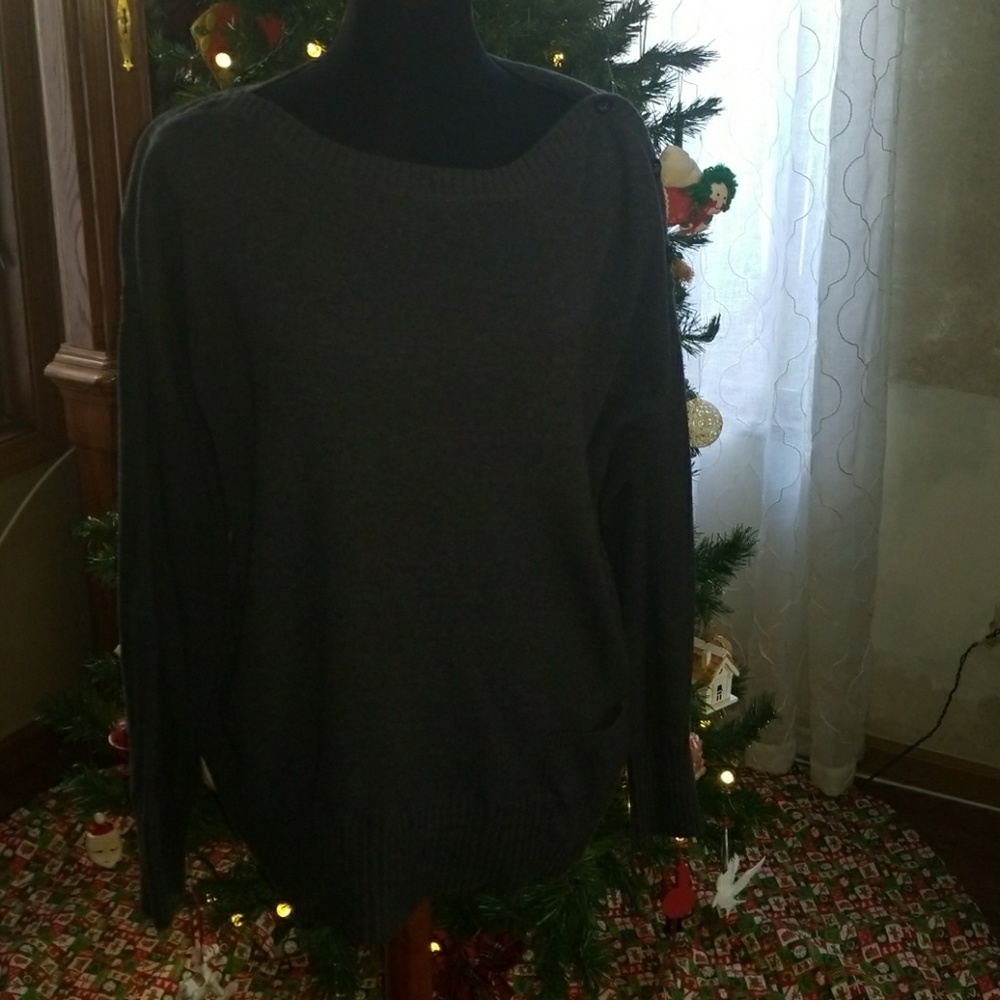 Sweater buttons on one shoulder