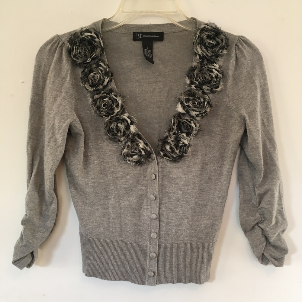 Ladies gray and black sweater.