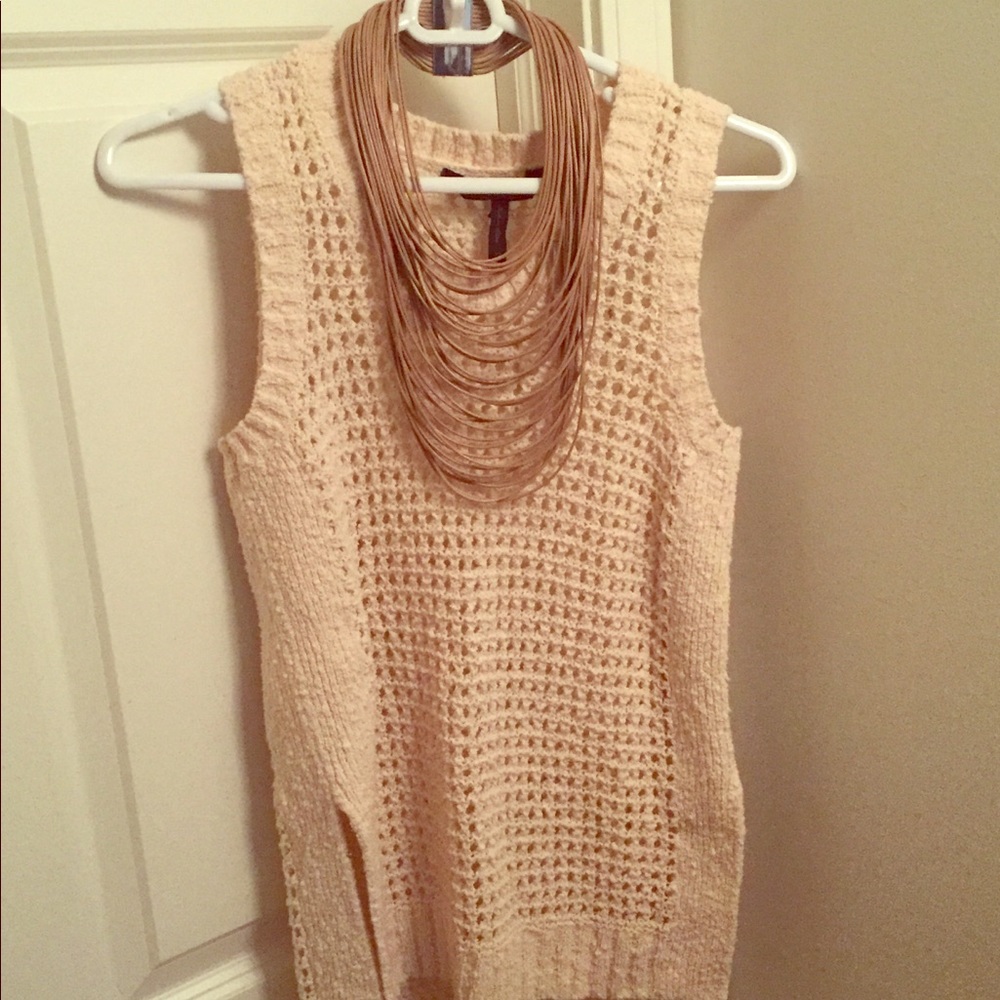 BC BG sleeveless sweater and Zenzii  accessory .