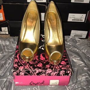 Gold open toe platforms
