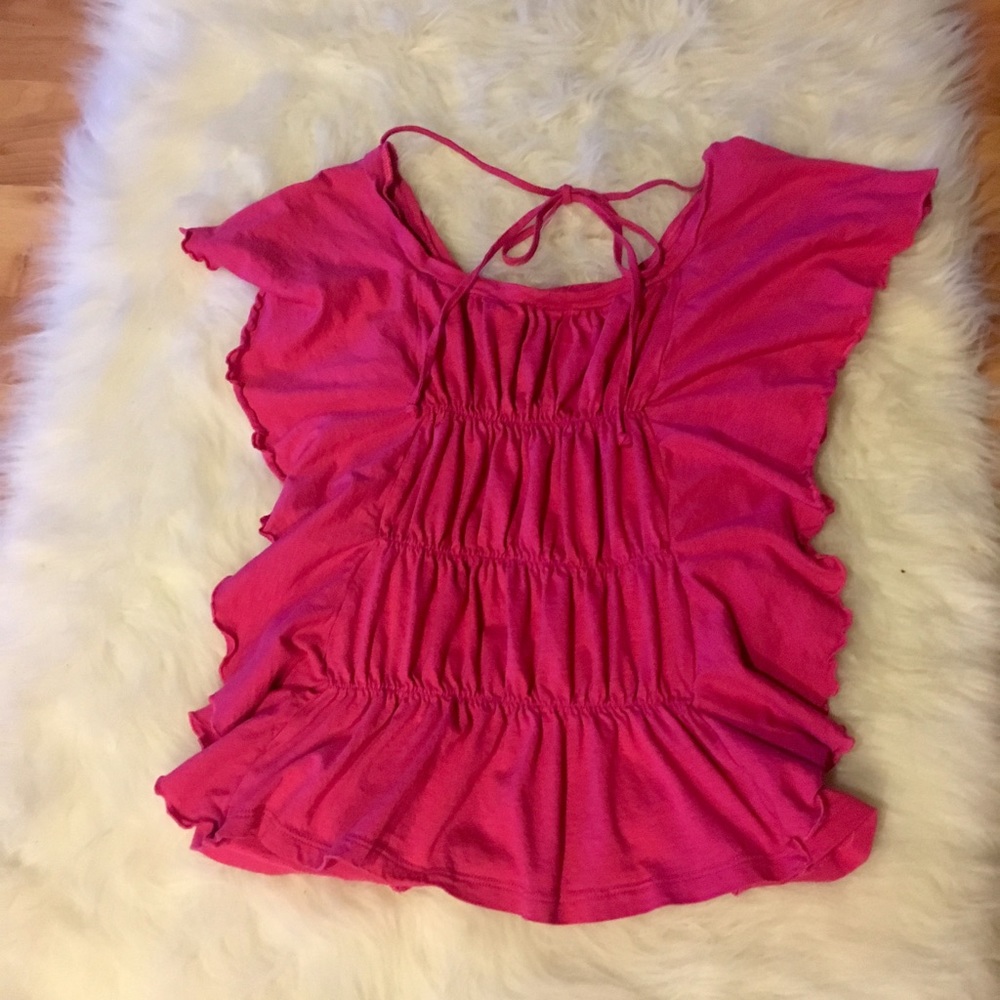 Bright pink ruffled top