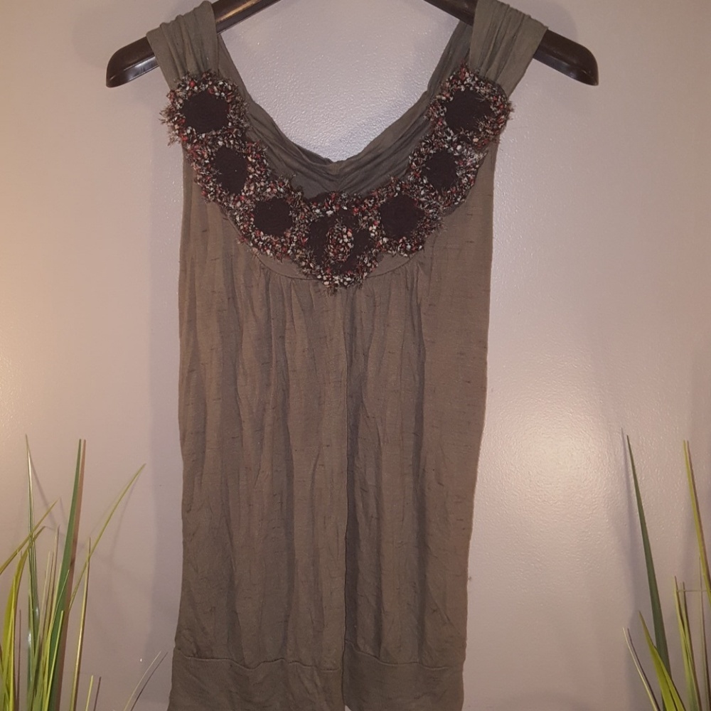 Embellished tank