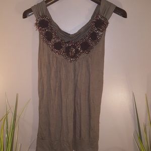 Embellished tank