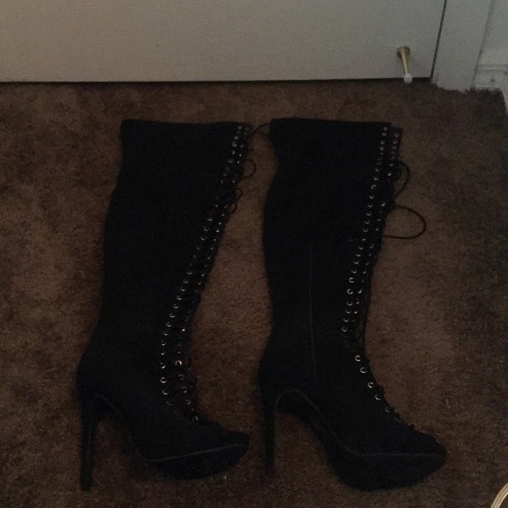 Thigh high caged lace up boots