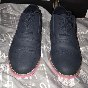 Blue Shoes with pink bottoms
