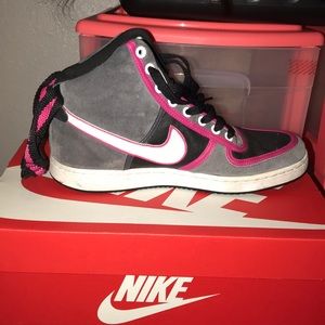 Black, Pink and white Nike’s