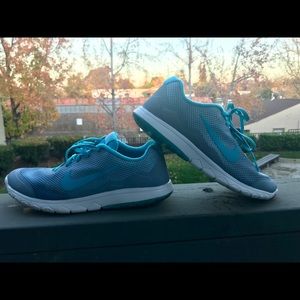 Size 8 Nike shoes gray and baby blue.