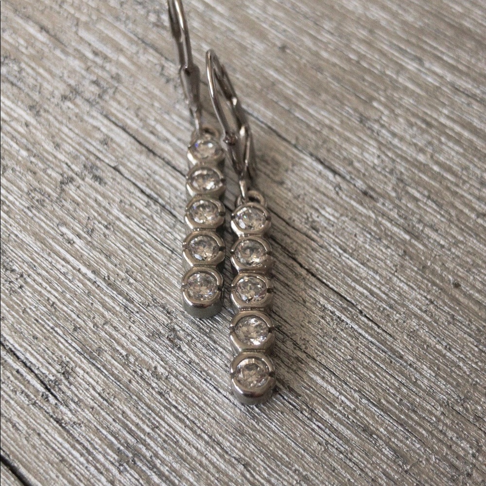 Sterling silver and CZ drop dangles, meshes well.
