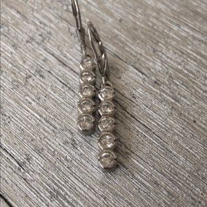 Sterling silver and CZ drop dangles, meshes well.