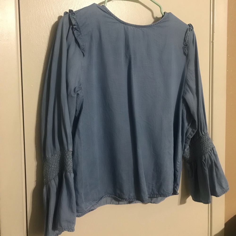 Top with bell sleeves