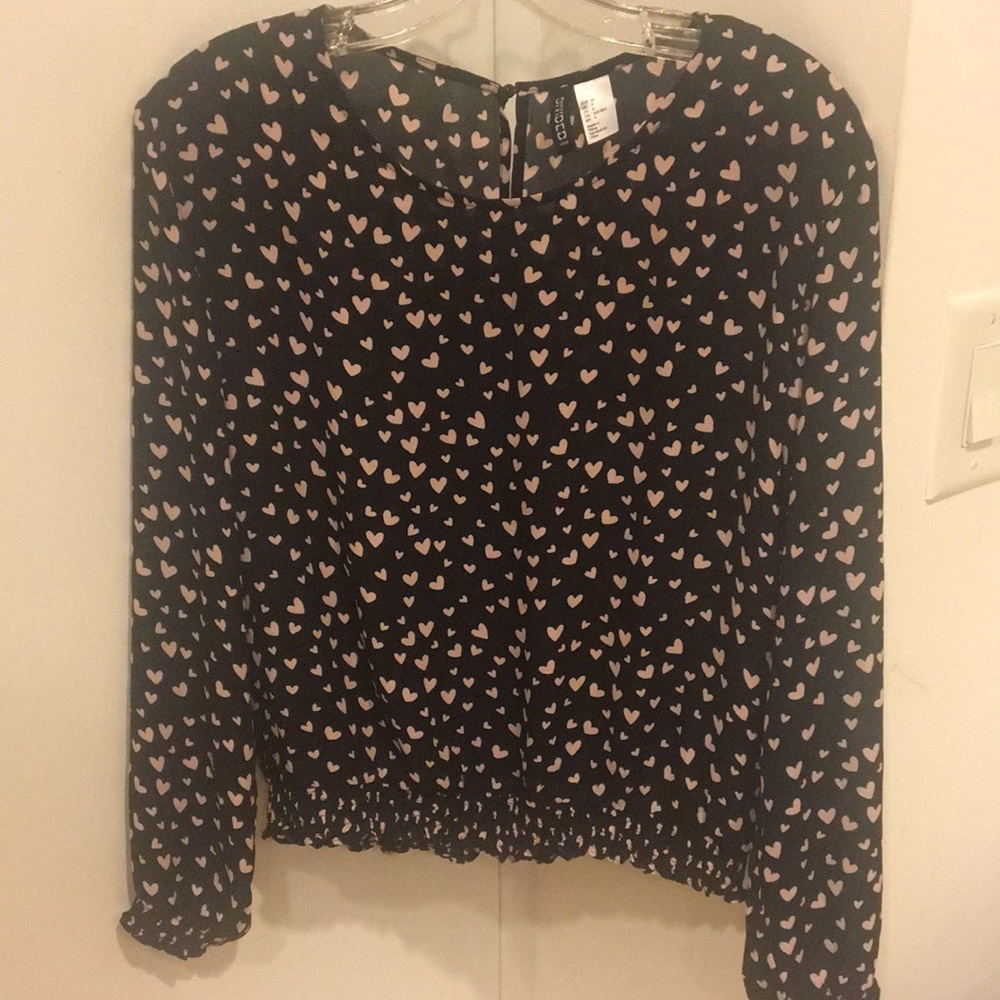 Long sleeve, dressy, heart blouse.