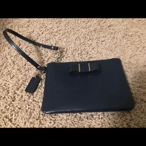 Coach navy patent leather with bow detail