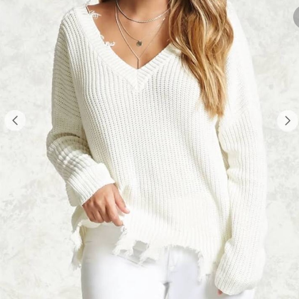 White distressed sweater