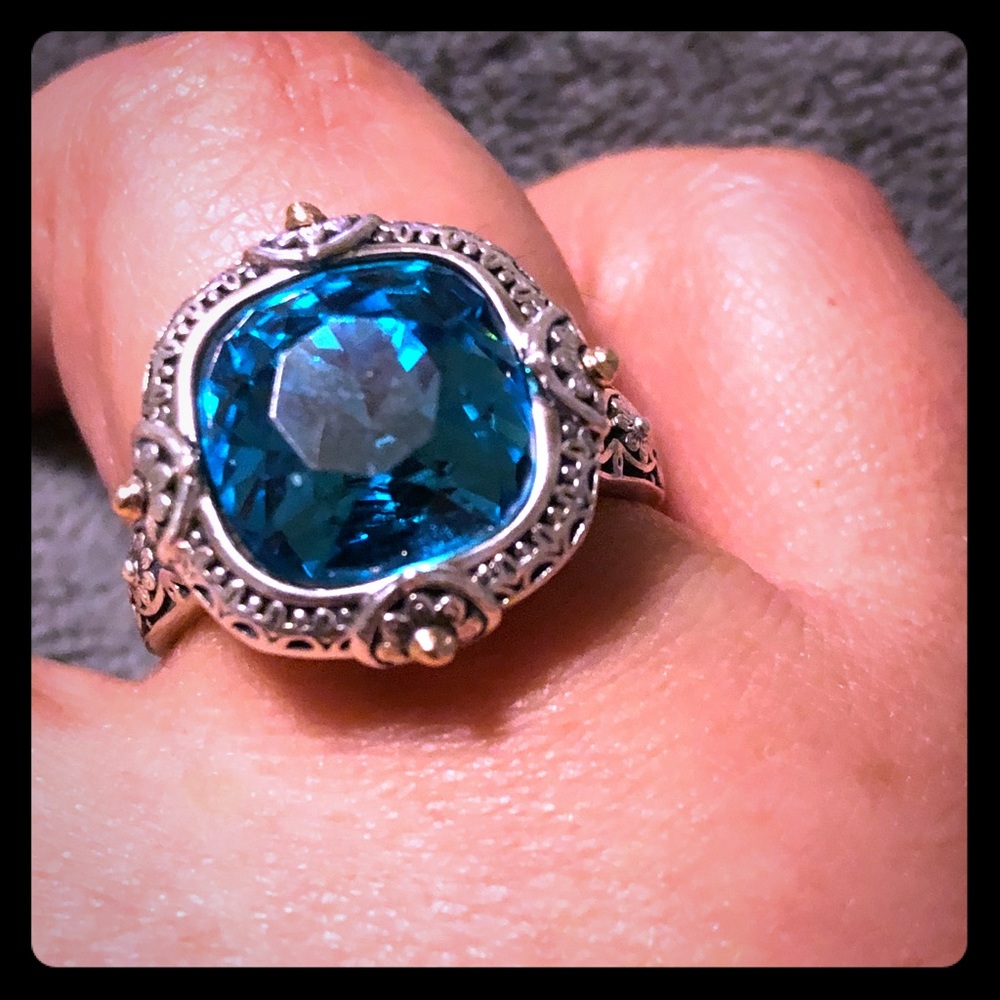 Blue topaz solid sterrling and gold ring