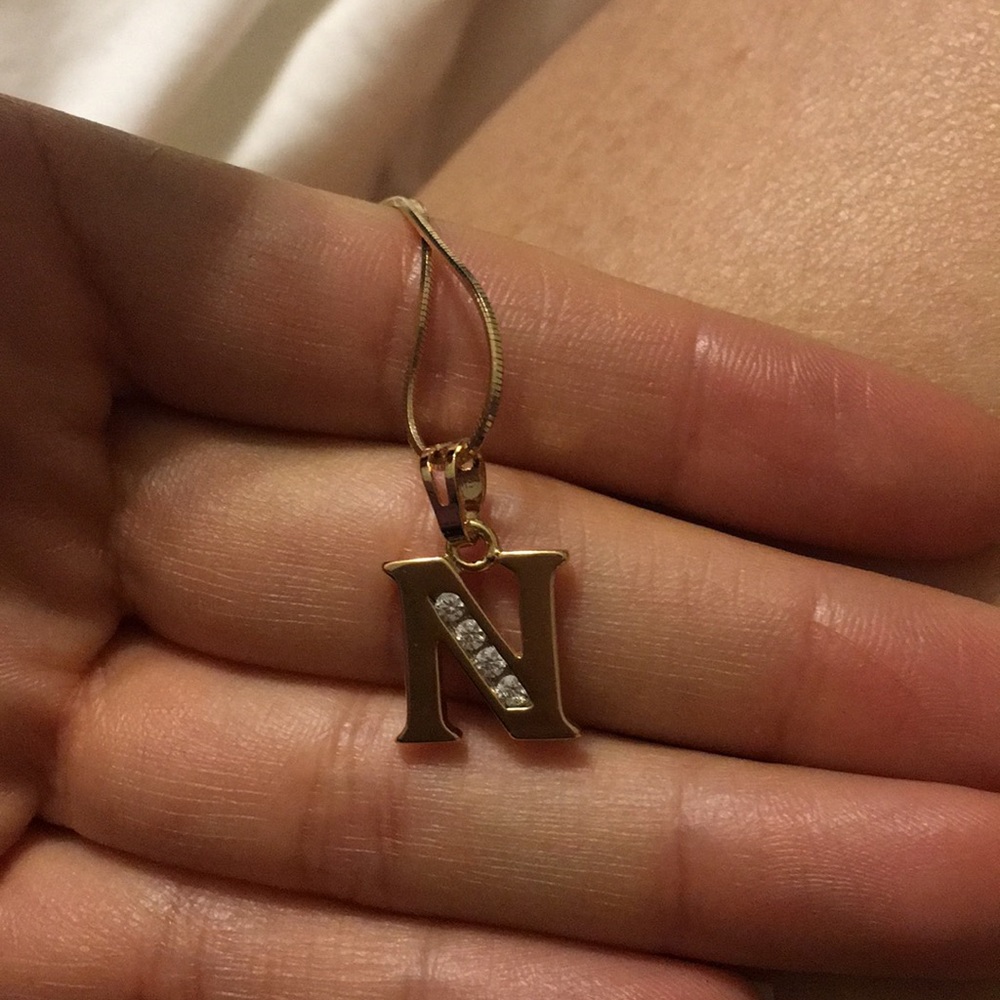 Necklace gold with letter n