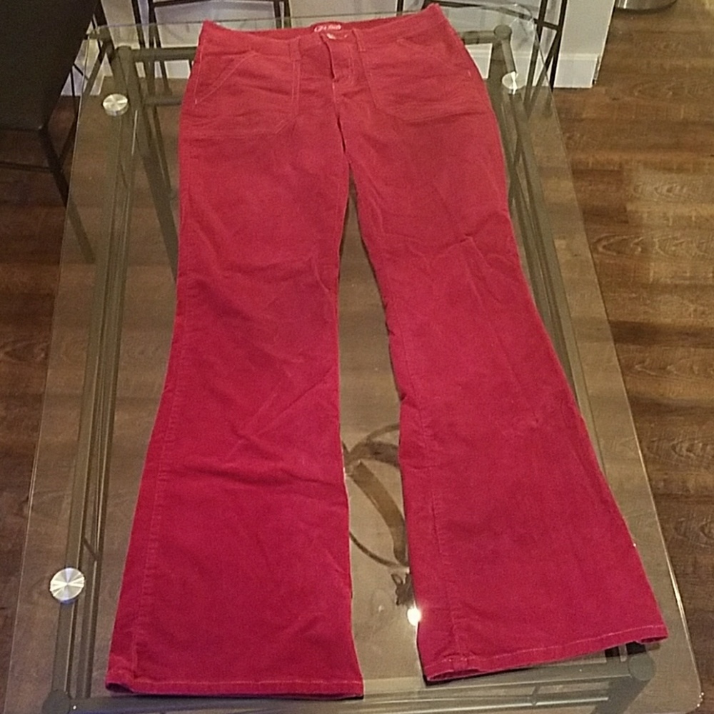 Bright red corduroy flare pants