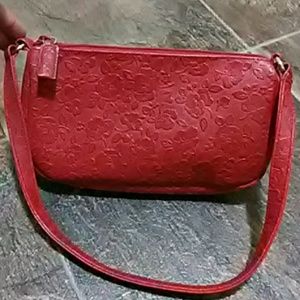 Red Relic rose embossed handbag