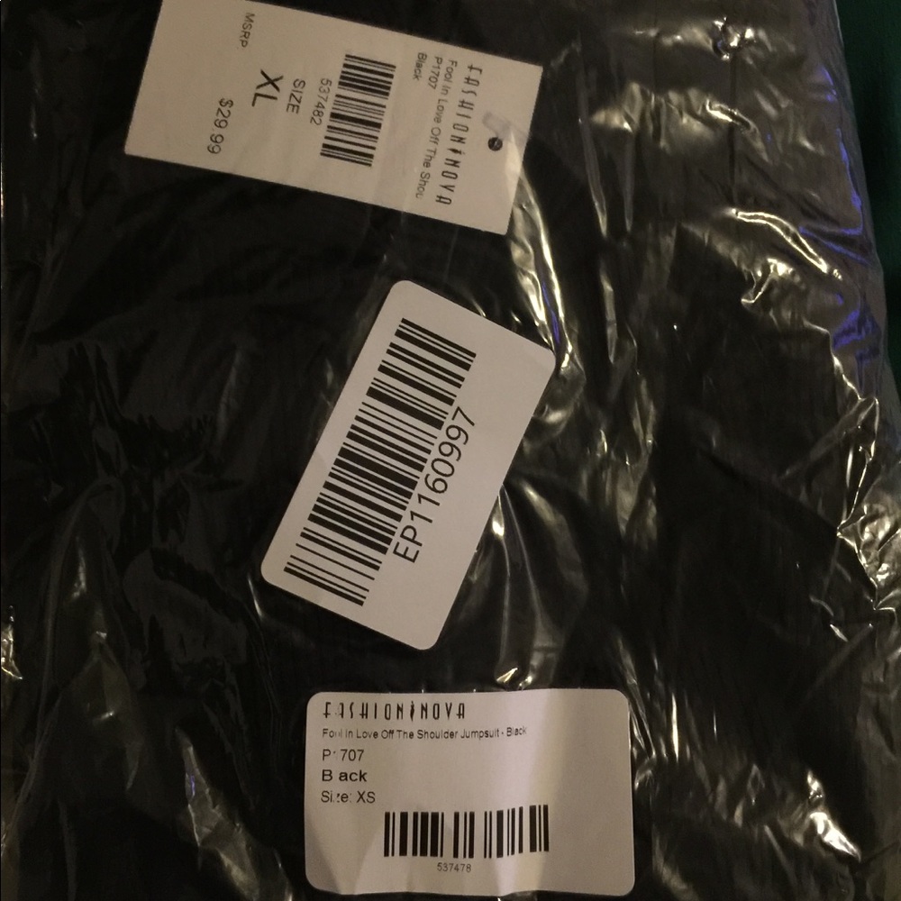 Fool is love jumpsuit, it's a size xl