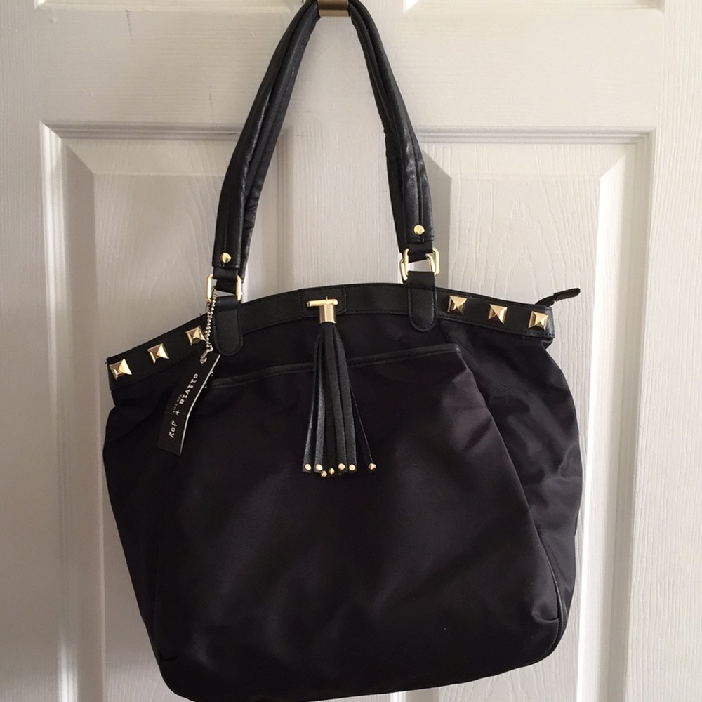 NWT black tote with studs and tassel
