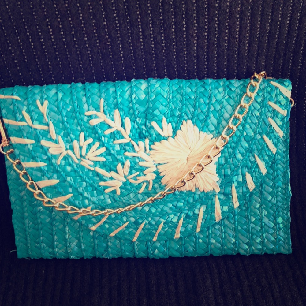 Turquoise straw clutch