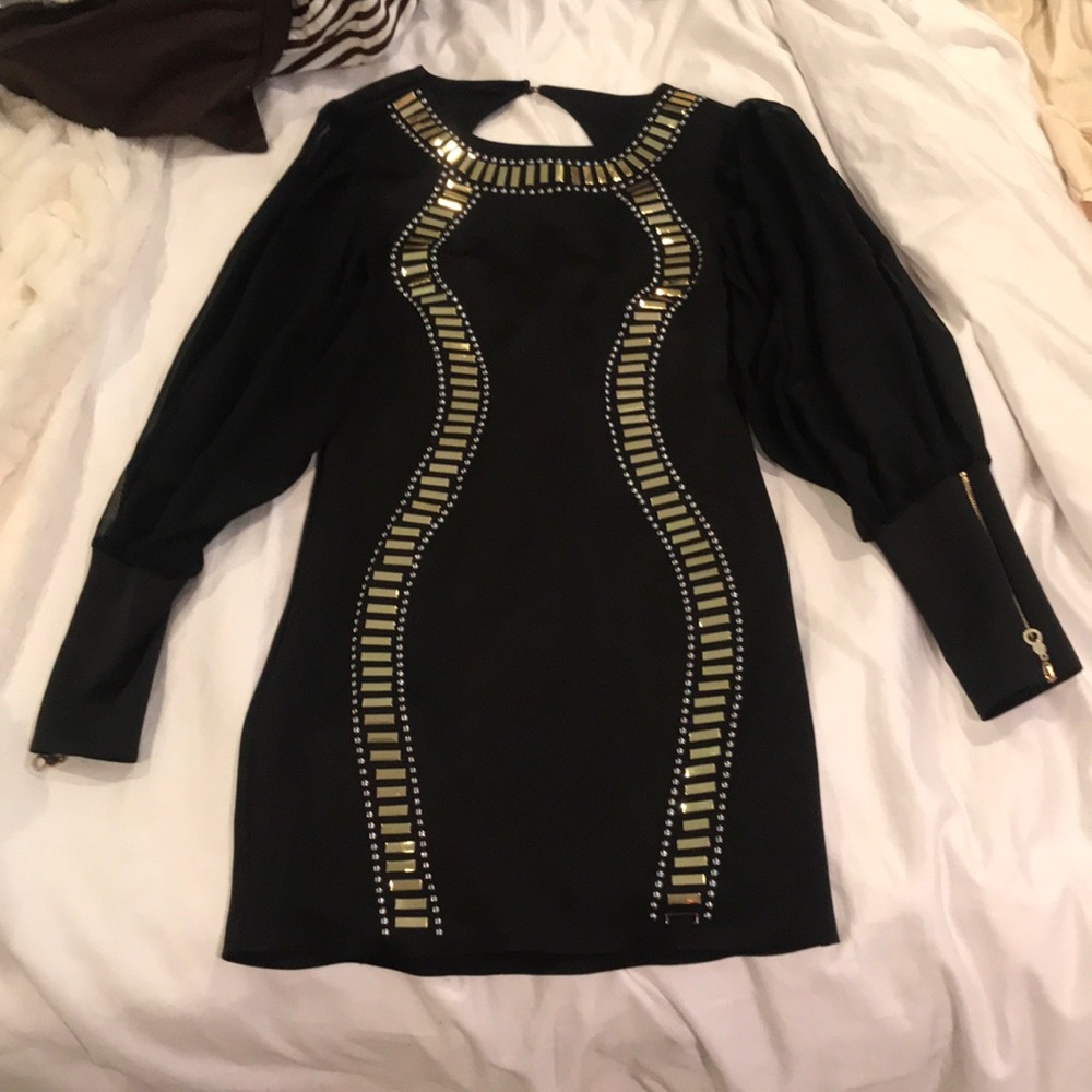 Black and gold mini. Worn once