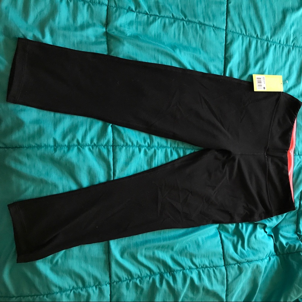 Black capri stretch pants. New with tags.