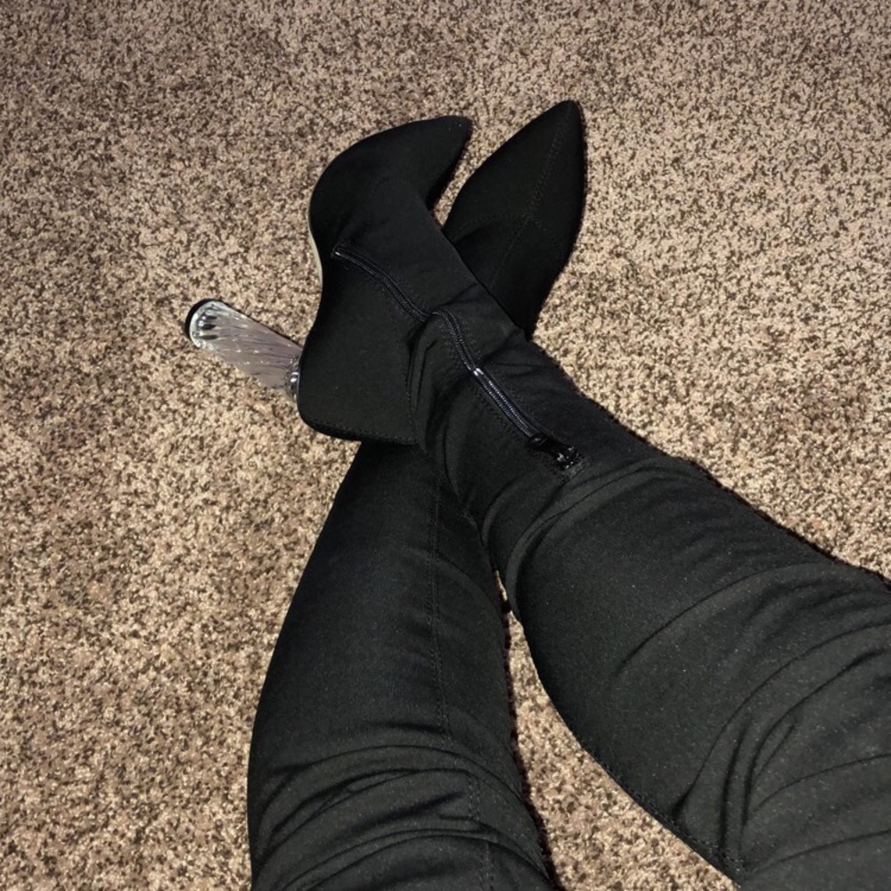 Black thigh high w/ clear heel boot.