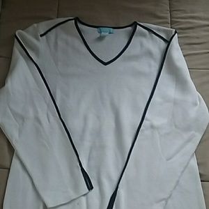 White sweater with black accent stripes
