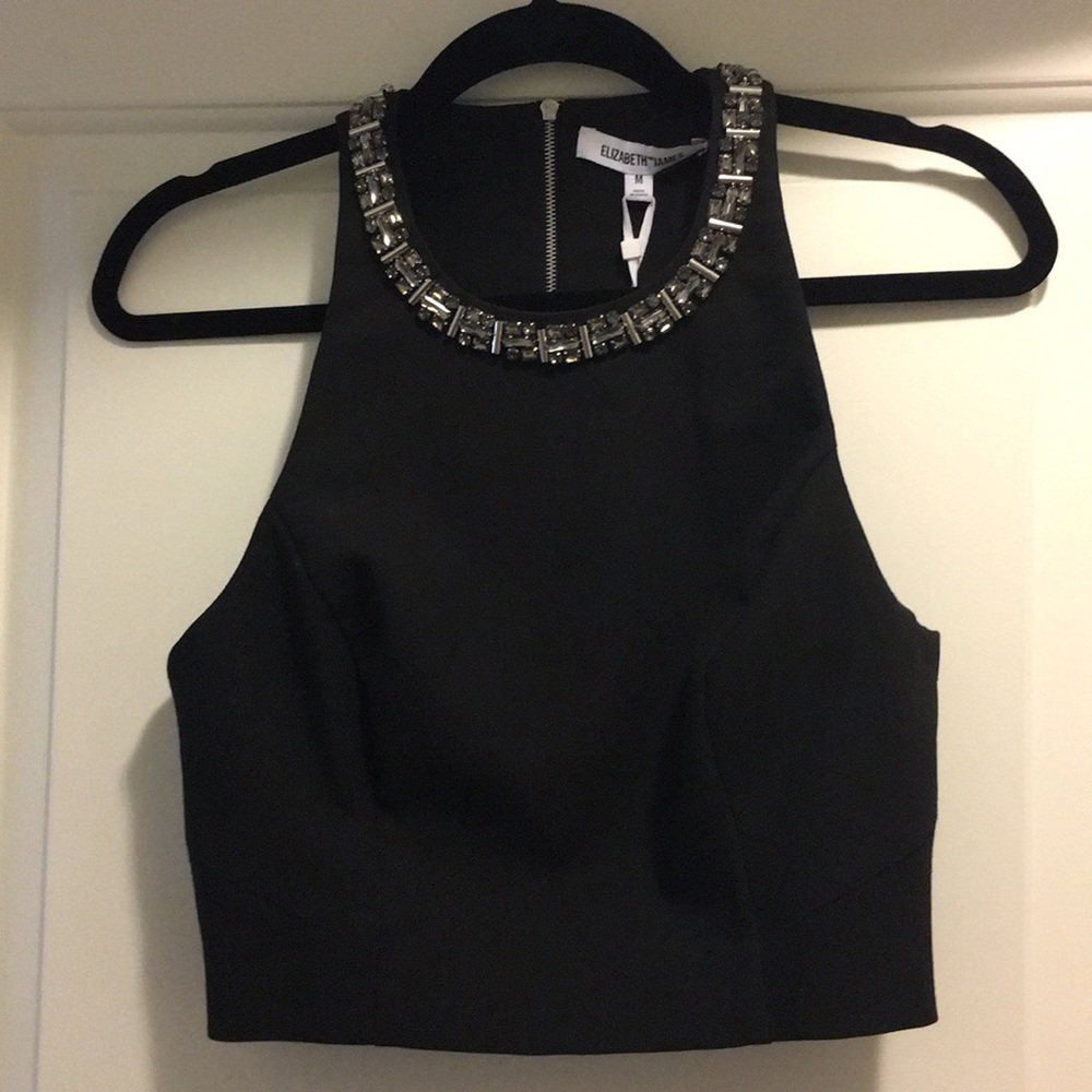 A beautiful BRAND NEW black top!