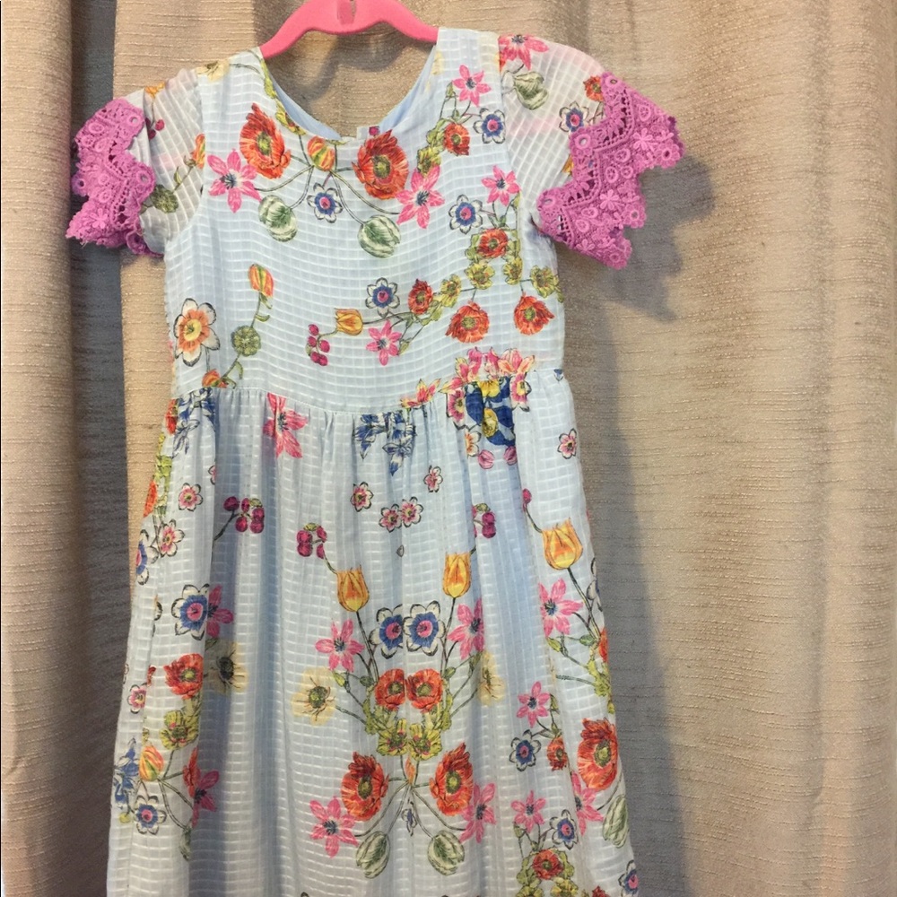 Silk dress with delicately embroidered lace