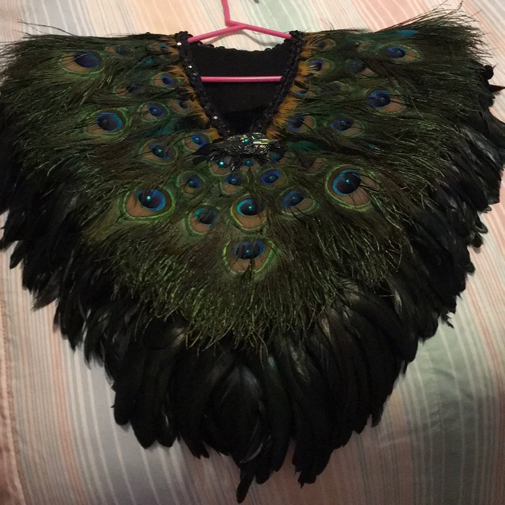 Peacock shrug