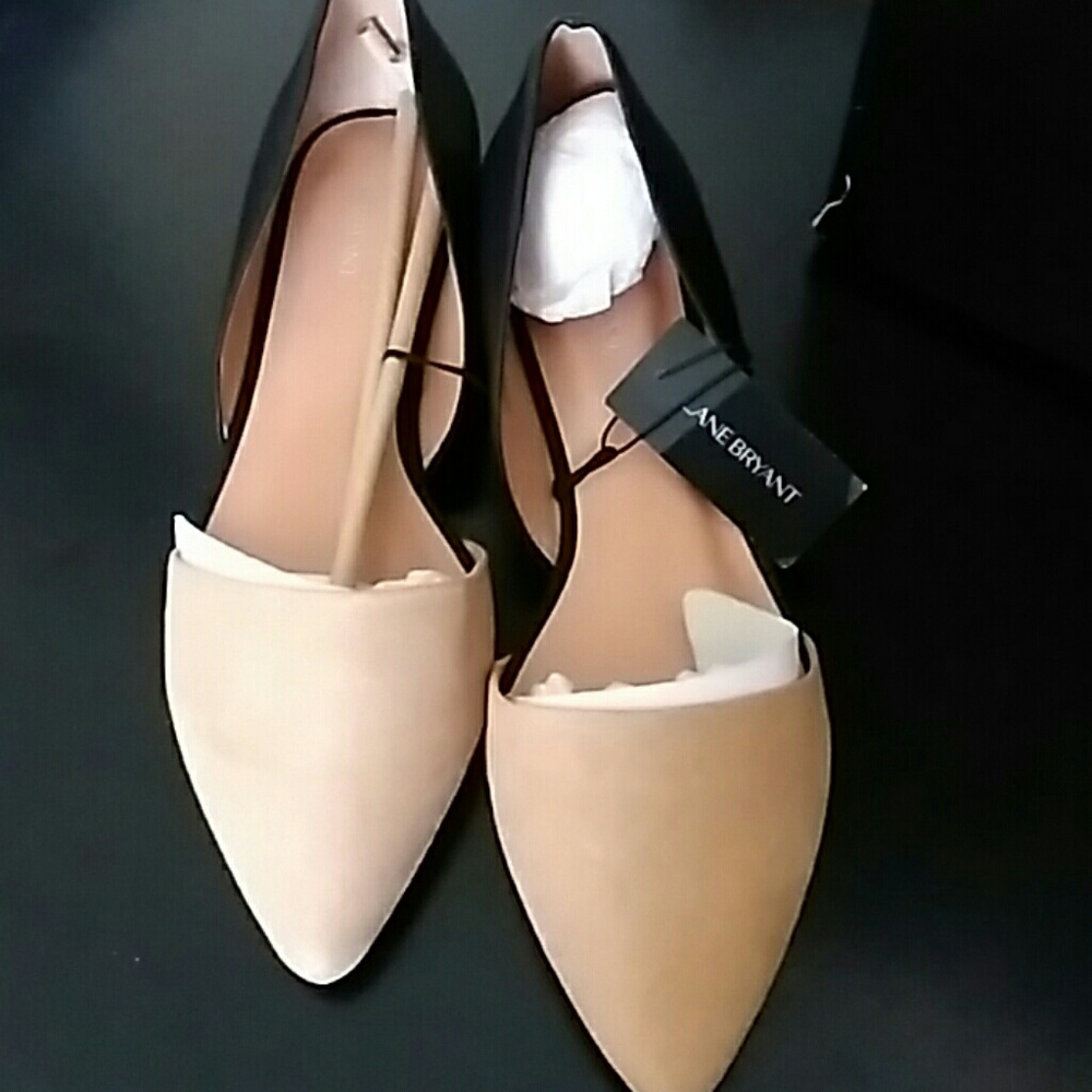 Tan and black flats
