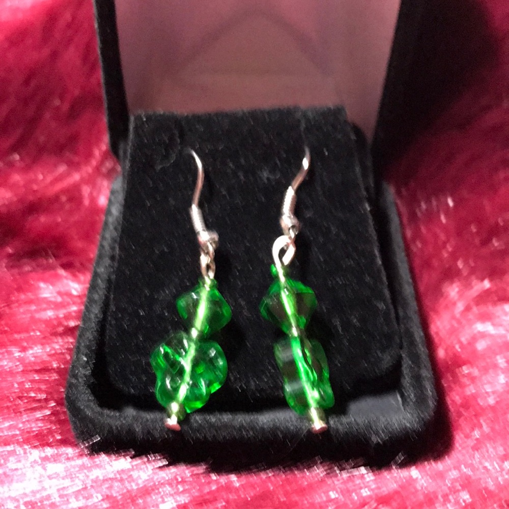 Green dangling earrings