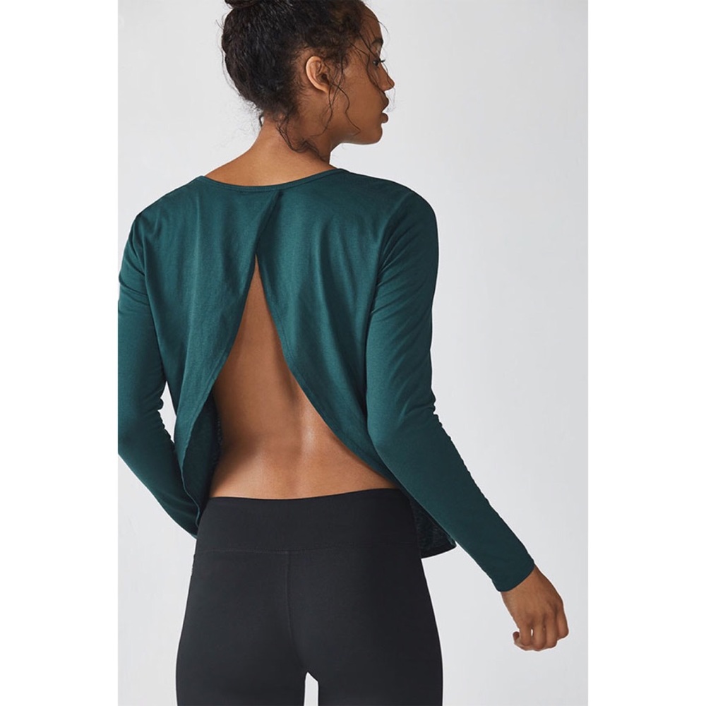 Fabletics spruce M sized “Millie” thrown on Tee