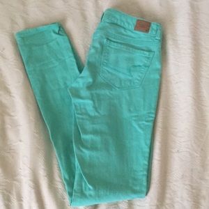 Dark mint skinny jeans