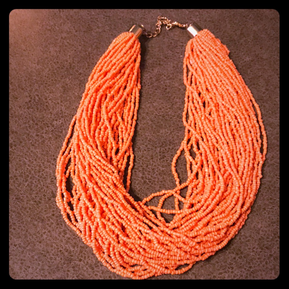 Coral and gold statement necklace