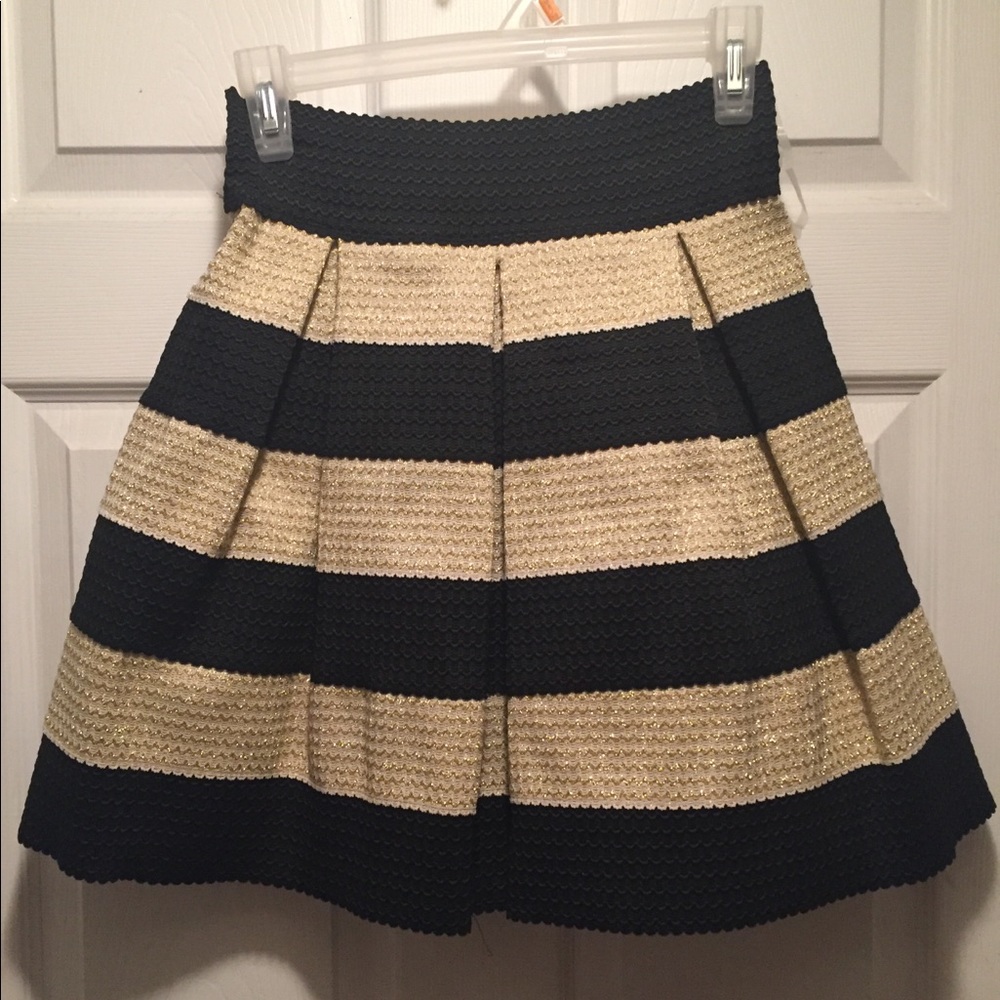 Knee length gold and black skirt