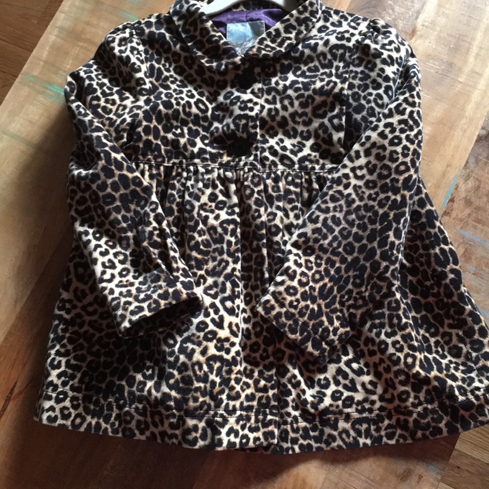 Leopard Jacket size 4-5 but can fit a size 6.