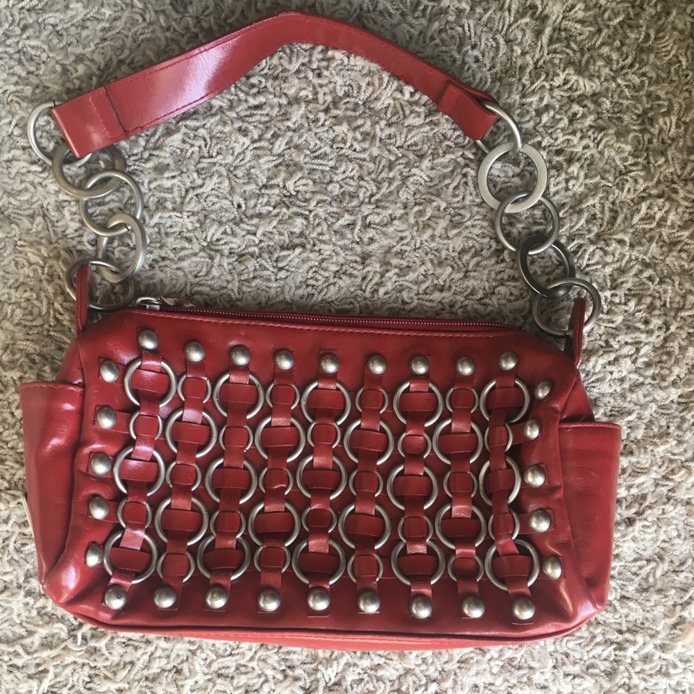 Red leather studded purse.