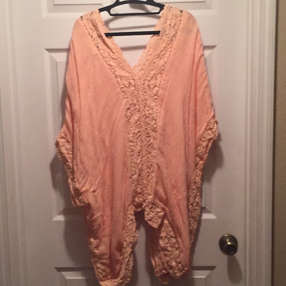 Peach poncho type shirt