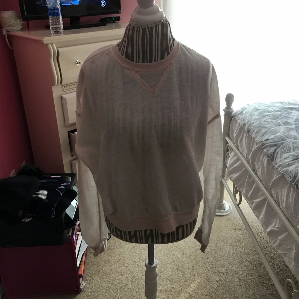 Pink Kendall and Kylie sweatshirt.