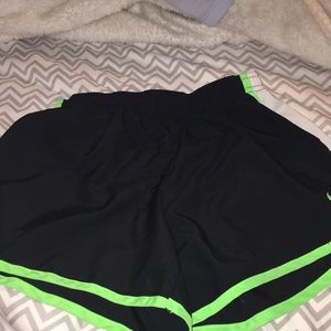 Girls black green and white shorts.