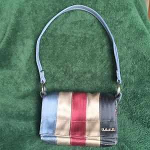 Seatbelt purse by U.S.E.D