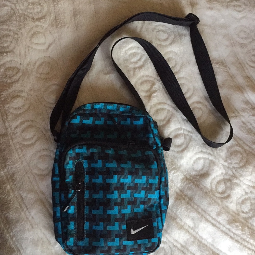 Blue patterned Nike over the shoulder bag