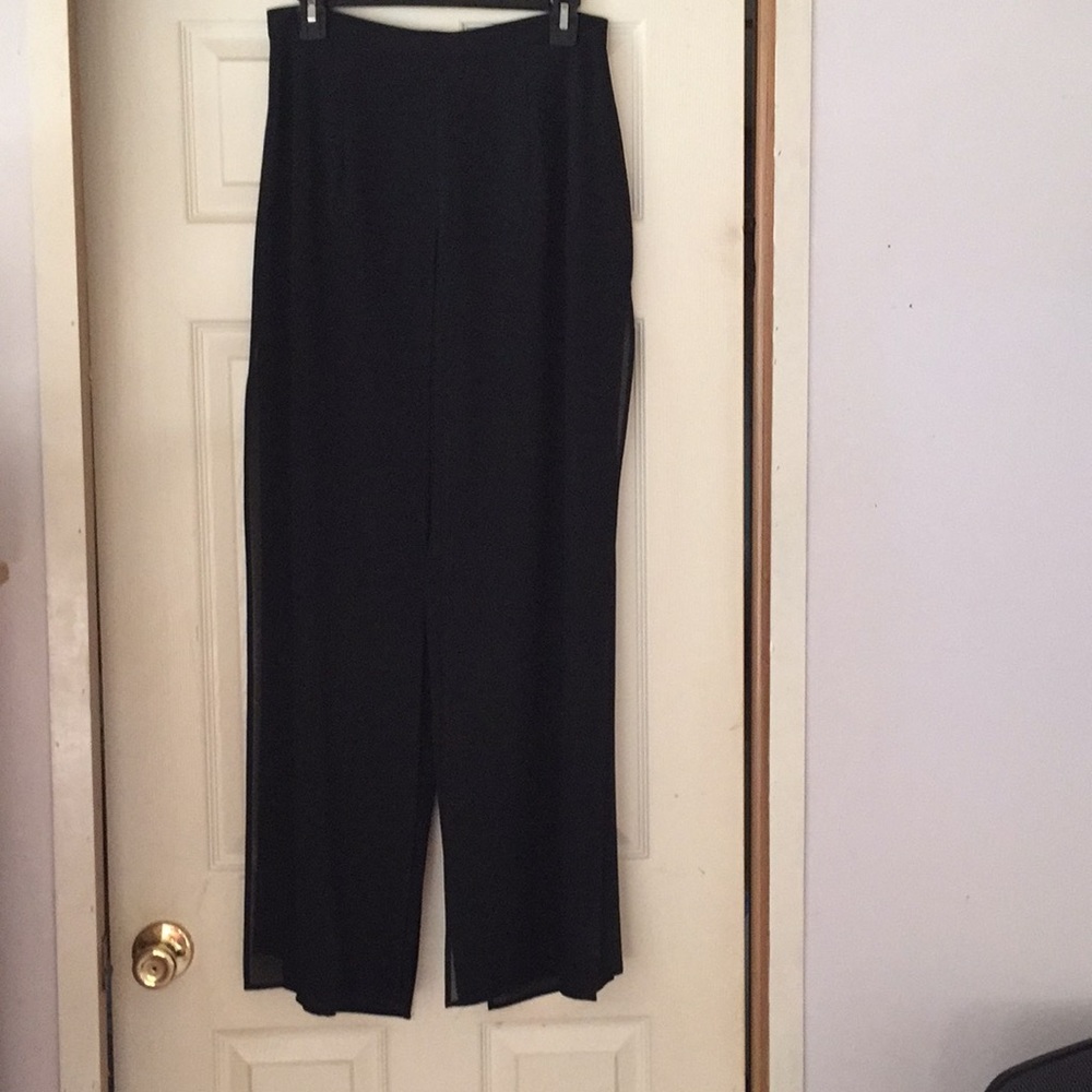 Black slacks but looks like you have a skirt on!