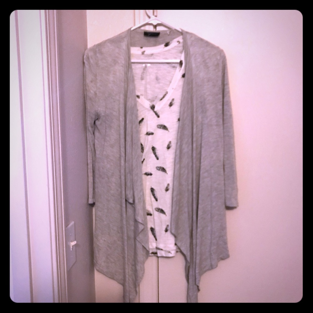 Tee shirt with sweater combo or separate.